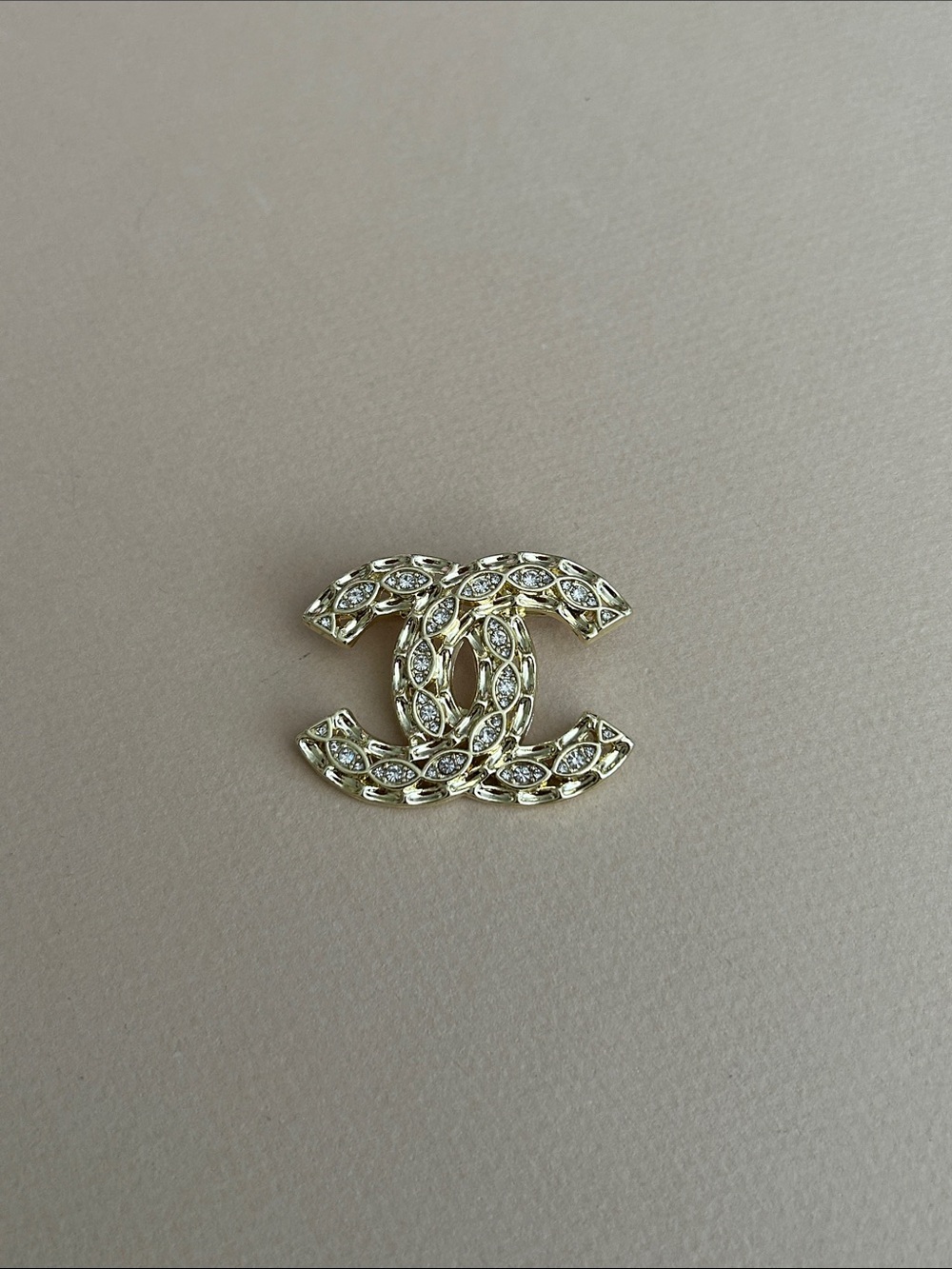 Chanel diamond brooch